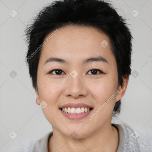 Joyful asian young-adult female with short  black hair and brown eyes