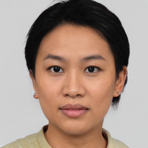 Neutral asian young-adult female with short  black hair and brown eyes