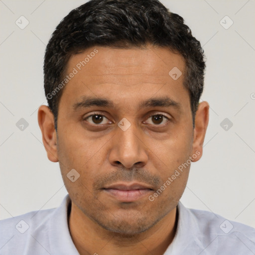 Neutral white young-adult male with short  black hair and brown eyes