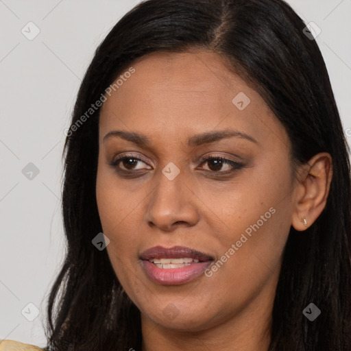 Joyful latino young-adult female with long  brown hair and brown eyes