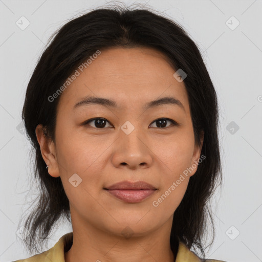 Joyful asian young-adult female with medium  brown hair and brown eyes