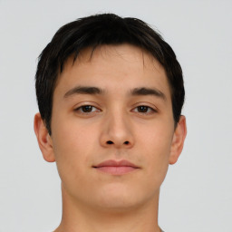 Neutral asian young-adult male with short  brown hair and brown eyes