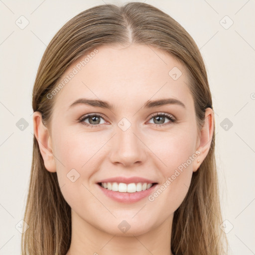 Joyful white young-adult female with long  brown hair and grey eyes