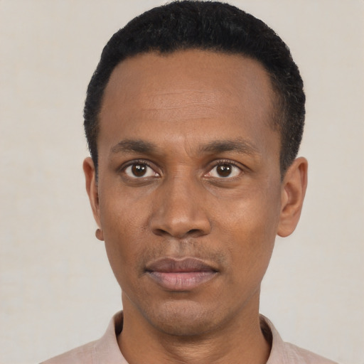 Neutral black young-adult male with short  black hair and brown eyes
