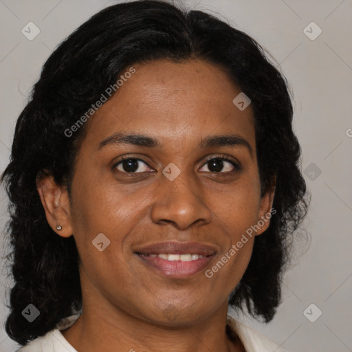 Joyful black young-adult female with medium  brown hair and brown eyes