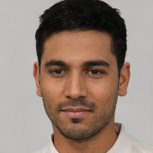 Neutral latino young-adult male with short  black hair and brown eyes
