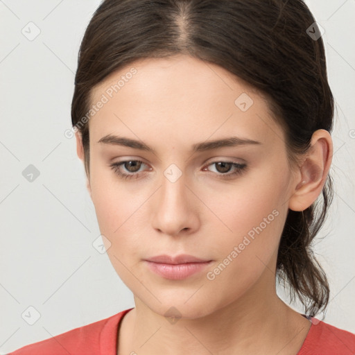 Neutral white young-adult female with medium  brown hair and brown eyes