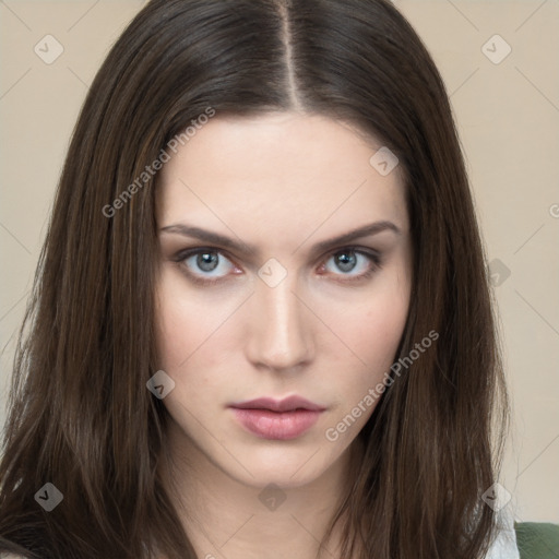 Neutral white young-adult female with long  brown hair and brown eyes