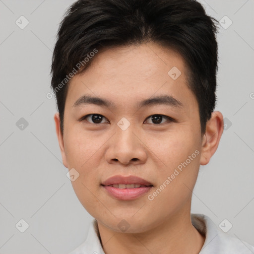 Joyful asian young-adult male with short  brown hair and brown eyes