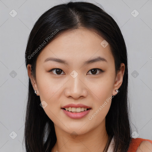 Joyful asian young-adult female with medium  black hair and brown eyes