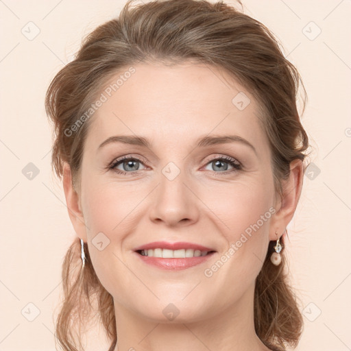 Joyful white young-adult female with long  brown hair and grey eyes