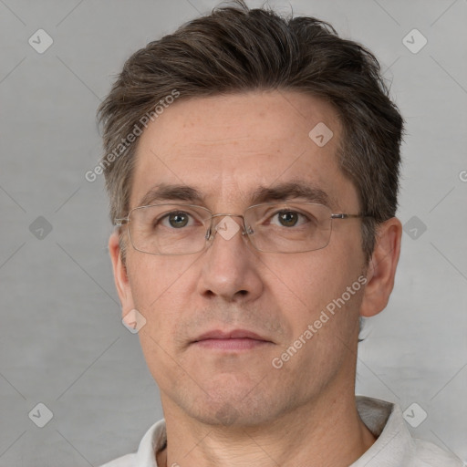 Neutral white adult male with short  brown hair and brown eyes