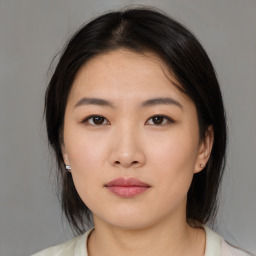 Neutral asian young-adult female with medium  brown hair and brown eyes