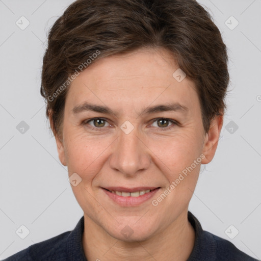 Joyful white adult female with short  brown hair and brown eyes