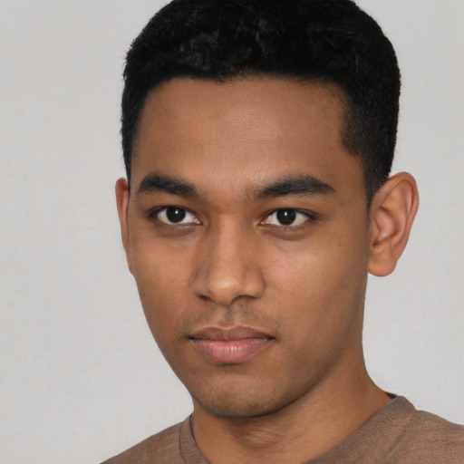Neutral black young-adult male with short  black hair and brown eyes