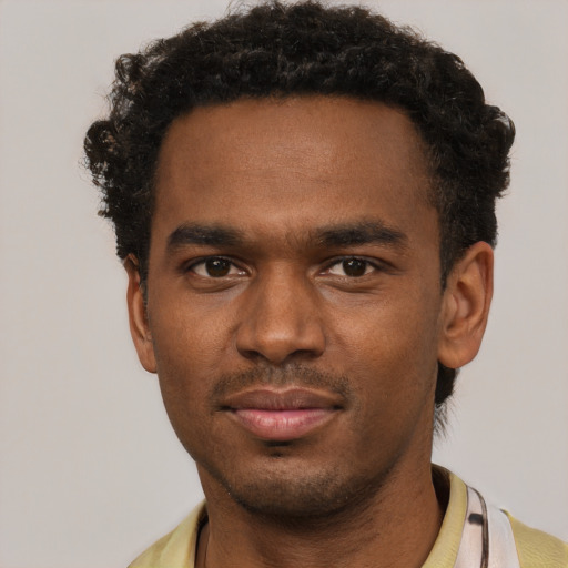 Neutral black young-adult male with short  brown hair and brown eyes
