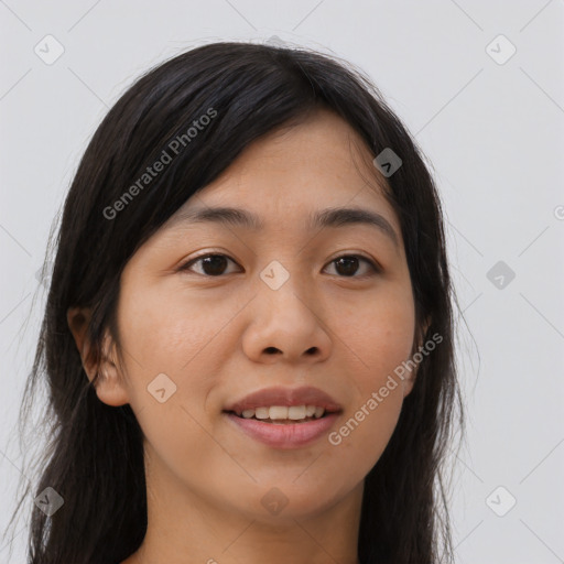 Joyful asian young-adult female with long  brown hair and brown eyes