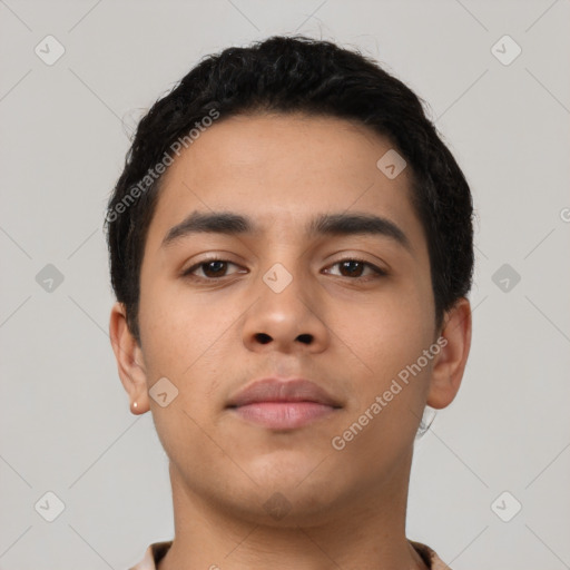 Neutral latino young-adult male with short  black hair and brown eyes