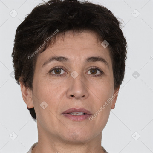 Joyful white adult female with short  brown hair and brown eyes