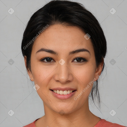 Joyful asian young-adult female with medium  black hair and brown eyes