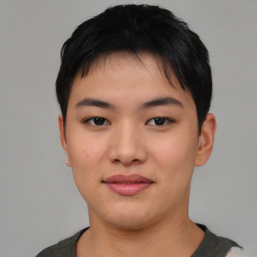 Joyful asian young-adult female with short  brown hair and brown eyes