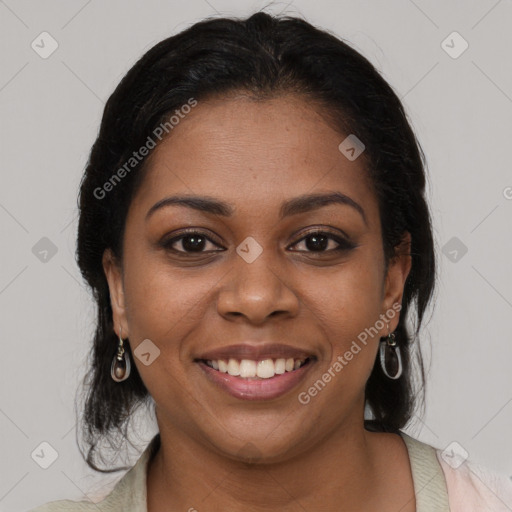 Joyful black young-adult female with medium  brown hair and brown eyes