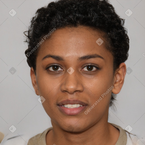 Joyful black young-adult female with short  brown hair and brown eyes