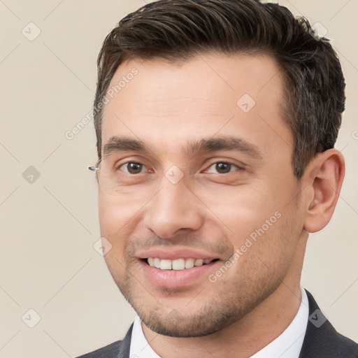 Joyful white young-adult male with short  brown hair and brown eyes