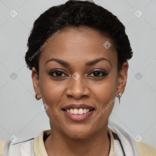 Joyful black young-adult female with short  black hair and brown eyes