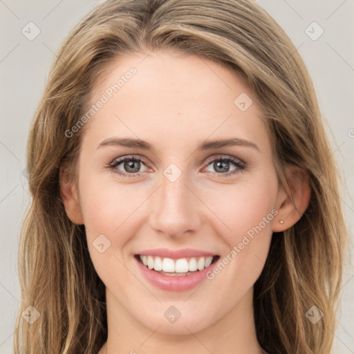 Joyful white young-adult female with long  brown hair and green eyes