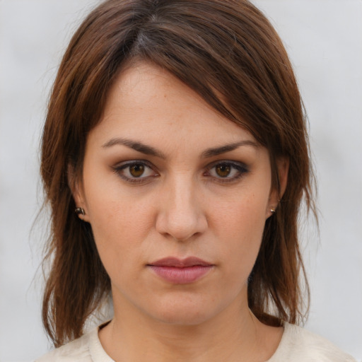 Neutral white young-adult female with medium  brown hair and brown eyes