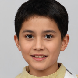 Joyful white child male with short  brown hair and brown eyes