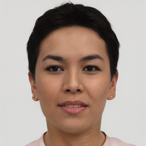 Joyful asian young-adult female with short  black hair and brown eyes