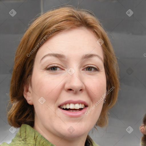 Joyful white adult female with medium  brown hair and grey eyes