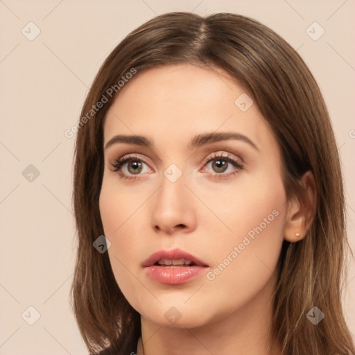 Neutral white young-adult female with long  brown hair and brown eyes