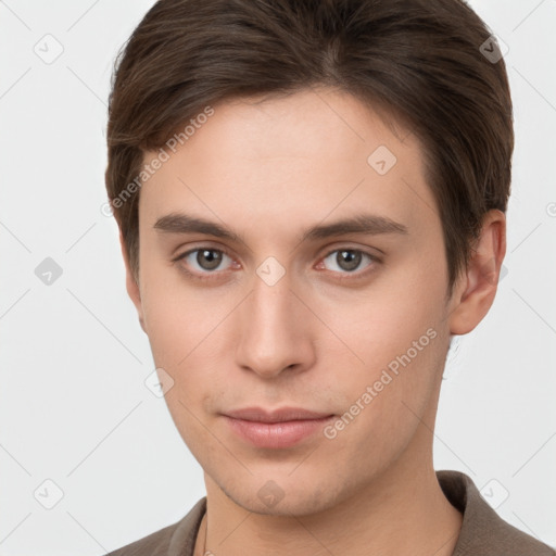 Neutral white young-adult male with short  brown hair and brown eyes