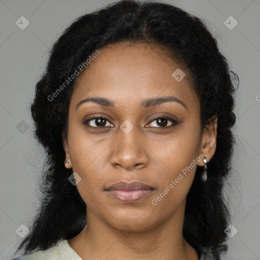 Neutral black young-adult female with medium  brown hair and brown eyes