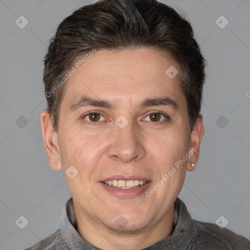 Joyful white adult male with short  brown hair and brown eyes