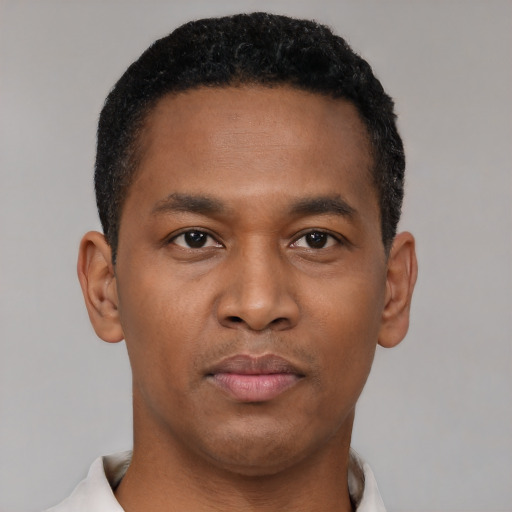 Neutral black young-adult male with short  black hair and brown eyes