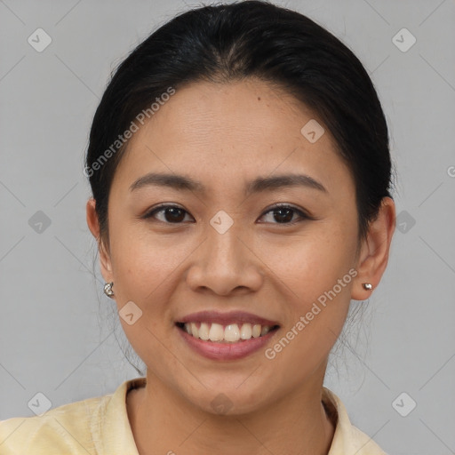 Joyful asian young-adult female with short  brown hair and brown eyes