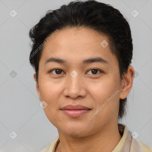 Joyful asian young-adult female with short  brown hair and brown eyes