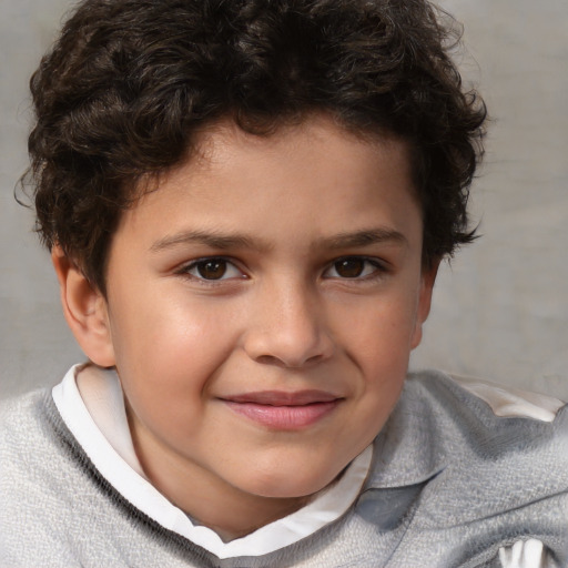 Joyful white child male with short  brown hair and brown eyes