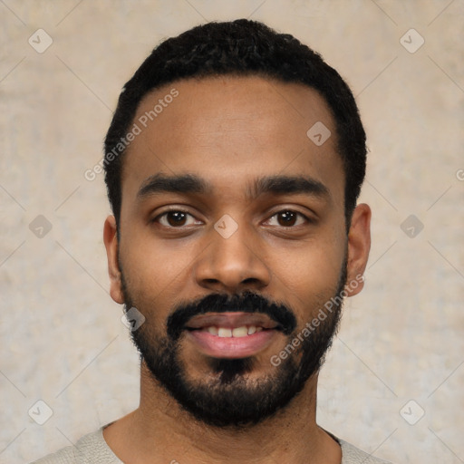 Neutral black young-adult male with short  black hair and brown eyes