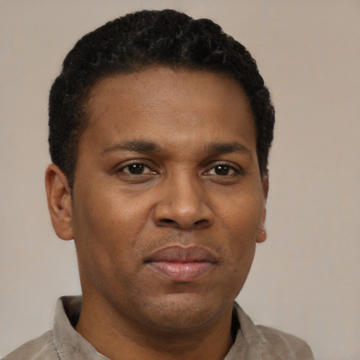Neutral black young-adult male with short  brown hair and brown eyes