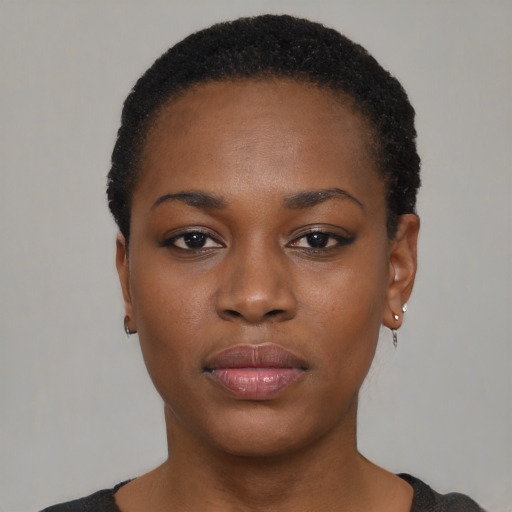 Neutral black young-adult female with short  black hair and brown eyes