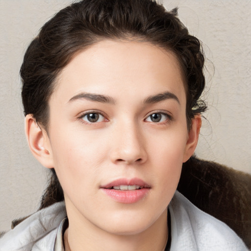 Neutral white young-adult female with short  brown hair and brown eyes