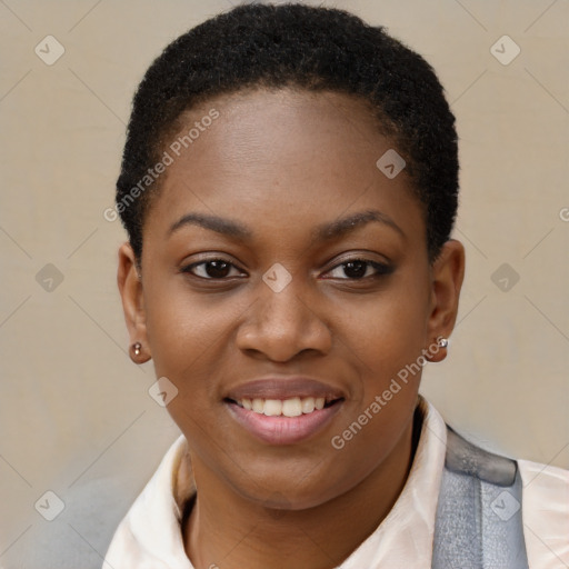 Joyful black young-adult female with short  brown hair and brown eyes