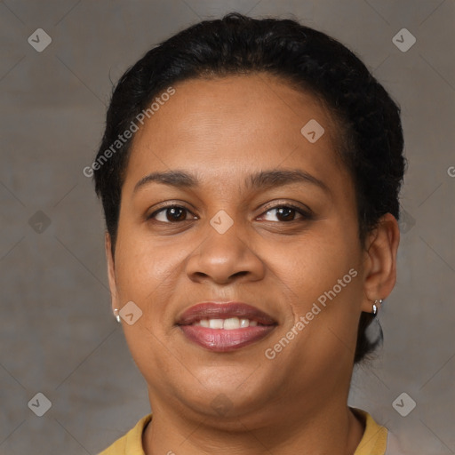 Joyful latino young-adult female with short  brown hair and brown eyes