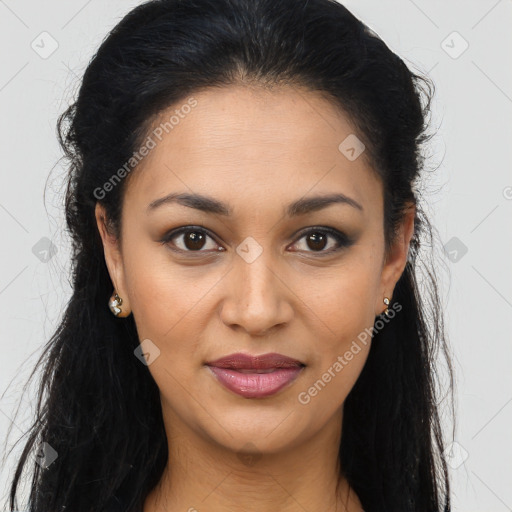 Joyful latino young-adult female with long  brown hair and brown eyes