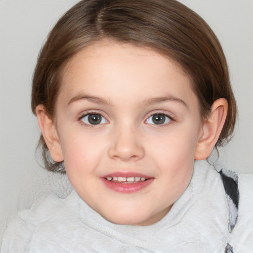 Joyful white child female with medium  brown hair and brown eyes